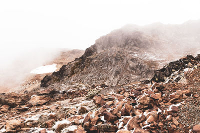 Scenic view of rocky mountains against sky