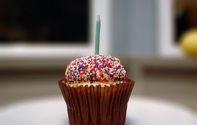 Close-up of cupcakes on cake