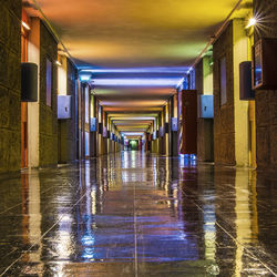 Illuminated corridor of building