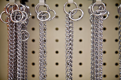 Close-up of chains hanging in store