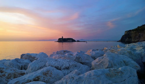 Scenic view of sea at sunset