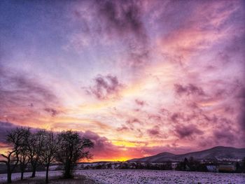 Scenic view of dramatic sky during sunset