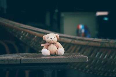 Close-up of toy on bench