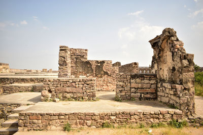 Golconda fort ruined walls in india area background stock photograph