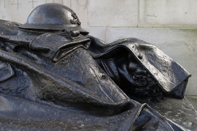 Close-up of statue against wall