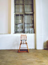 Empty chair in building