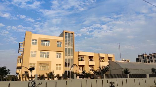 Low angle view of buildings against sky