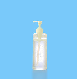 Close-up of bottle against blue background