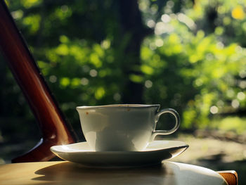 Close-up of coffee cup on table