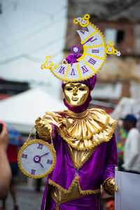 People dressed in venice carnival style are seen during the carnival 