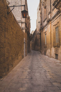 Narrow alley along buildings