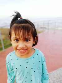 Portrait of smiling innocent girl