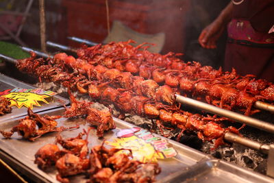 Close-up of meat on barbecue grill