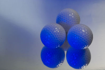 High angle view of blue balls on table