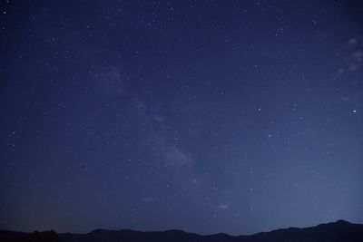 Low angle view of stars in sky at night