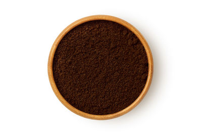 Directly above shot of black coffee on white background