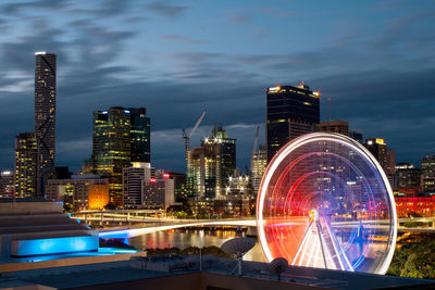 Brisbane southbank australia in the night with turning wheel light.