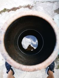 High angle view of man standing on metal