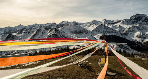 Scenic view of snowcapped mountains against sky