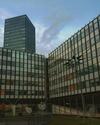 Low angle view of modern building against sky