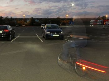 Cars on road at night