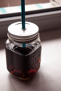 High angle view of drink in glass on table