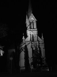 Low angle view of cathedral against sky at night