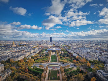 Paris cityscape view from the eiffel tower heights, france. montparnasse tower and les invalides 