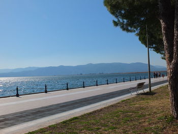 Scenic view of sea against clear blue sky