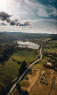 High angle view of road amidst landscape against sky