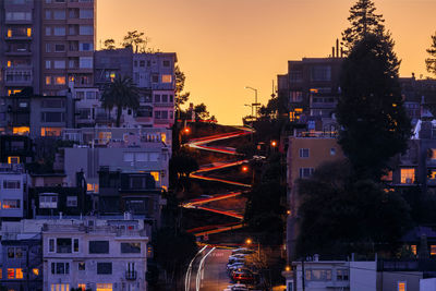 Illuminated buildings in city at night