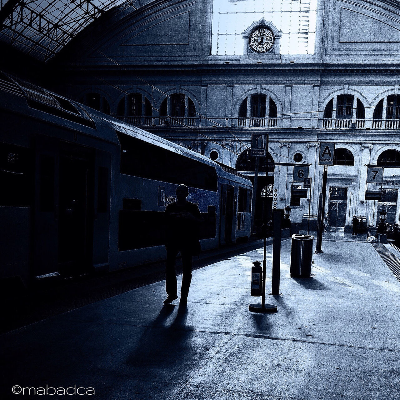 architecture, built structure, men, arch, person, indoors, lifestyles, walking, building exterior, travel, railroad station, architectural column, transportation, leisure activity, incidental people, full length, travel destinations, city life