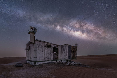 Scenic view of sea against sky at night