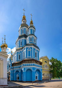 Low angle view of building against blue sky