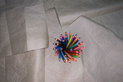 High angle view of multi colored pencils on table