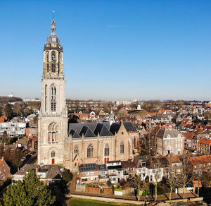 High angle view of buildings against clear sky