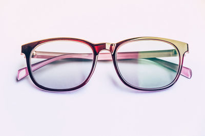 Close-up of eyeglasses against white background