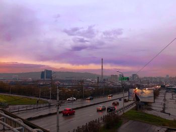 High angle view of cityscape against sky at sunset