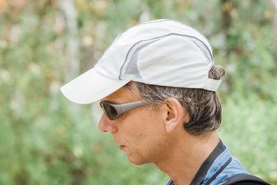 Close-up portrait of man wearing sunglasses