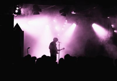 People enjoying at concert