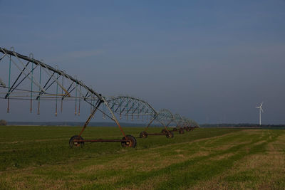 Scenic view of agricultural field against clear sky