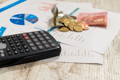 Close-up of coins on table