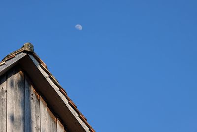 Low angle view of building against blue sky