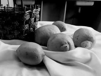 Close-up of lemons on textile