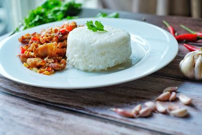 Close-up of food served on table