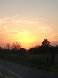 Scenic view of landscape at sunset
