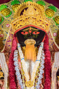 Close-up of buddha statue in temple