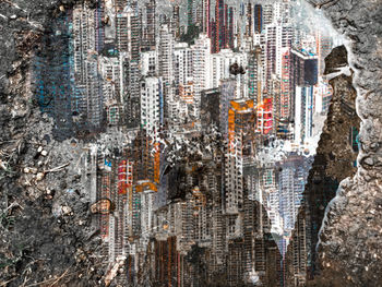 Digital composite image of modern buildings in city