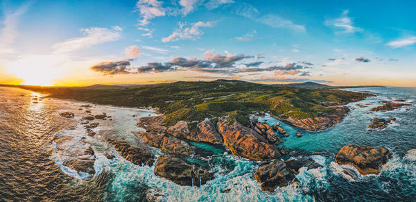 Panoramic view of sea against sky during sunset