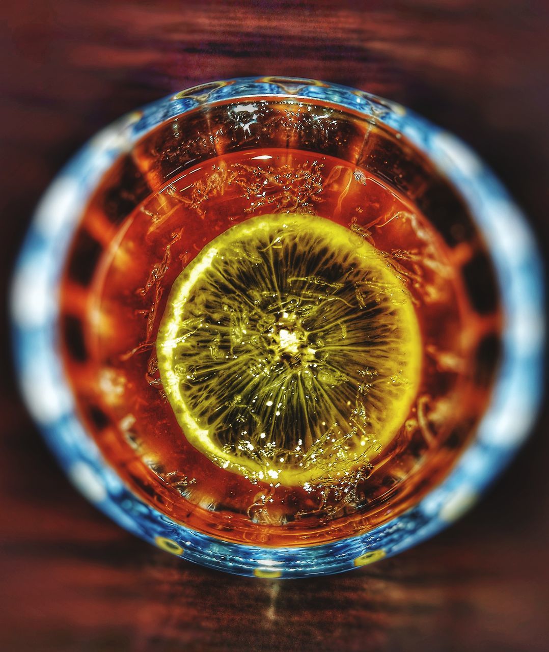 CLOSE-UP OF DRINK IN GLASS